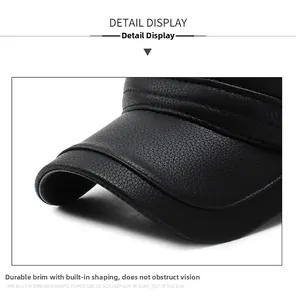 Detail view of the durable PU leather brim with reinforced stitching on a winter baseball cap