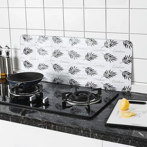 Foldable aluminum kitchen oil splash guard with black and white leaf pattern design