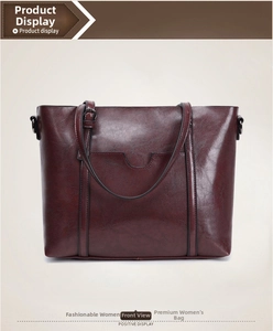 Vue de face d'un sac cabas vintage bordeaux avec doubles anses et poche décorative en U