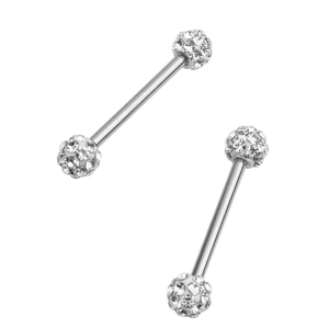 Macro detail of silver surgical steel nipple rings with clear crystal paved balls