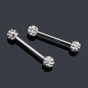 Detailed close-up of two silver straight barbell piercing rings with clear zircon stones