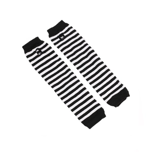 Detail of black and white striped knit arm warmers with heart-shaped cut-out design