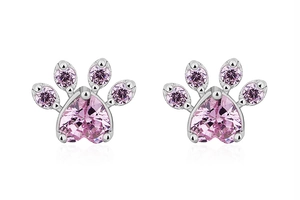 Detail view of rose gold paw print studs with heart shaped pink crystal stones
