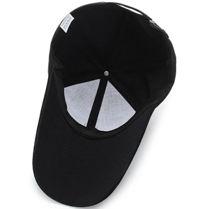 Internal view of black minimalist 100% cotton baseball cap with adjustable buckle