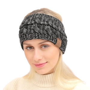 Detail of chunky knit headband in grey marl yarn with a premium CC leather patch