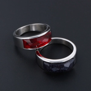 Set of two stainless steel rings with rectangular red and blue faceted gemstones