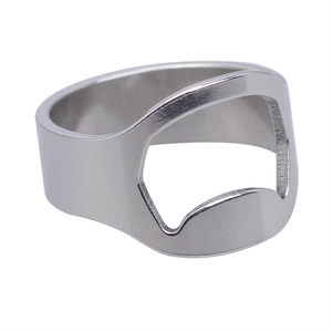Macro side view of polished stainless steel ring featuring integrated bottle opener function