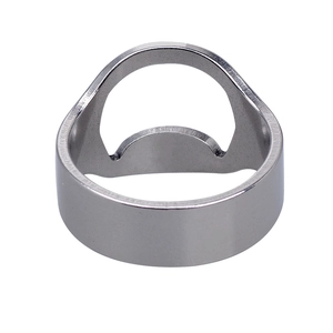 Macro shot of silver stainless steel ring bottle opener with a sleek polished finish