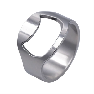 Detailed macro view showing the functional bottle opener notch inside a wide silver ring