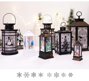 Detail of Christmas lanterns with festive patterns and glowing LED flame effect