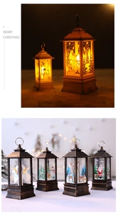 Macro view of Christmas LED lanterns featuring snowman and reindeer painted motifs