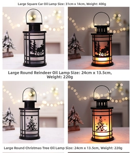 Detail view of large Christmas flame lantern with reindeer silhouette and LED warm light