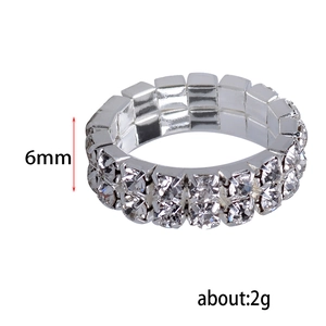 Detail showing 6mm width and 2g weight of silver triple-row crystal stretch ring