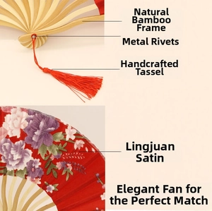 Detail of red Japanese silk folding fan with bamboo ribs and elegant tassel charm