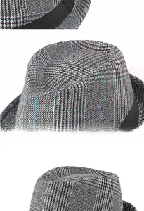 Detail of British style jazz hat featuring gray and black plaid with bright blue stripes