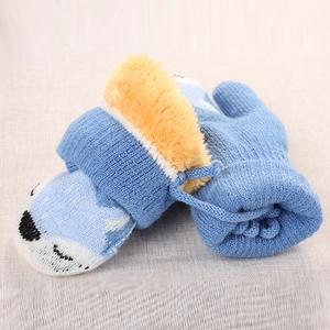 Winter knit fox mittens for kids with blue knit exterior and soft yellow fleece lining