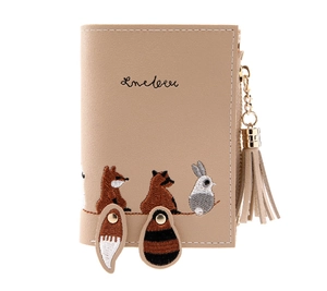 Detail of beige short wallet with cute animal embroidery, tassels, and zip closure