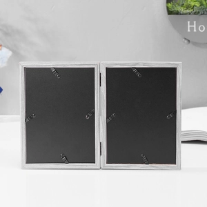 Three-fold foldable wood-textured photo frame with black backboard and metal hinges