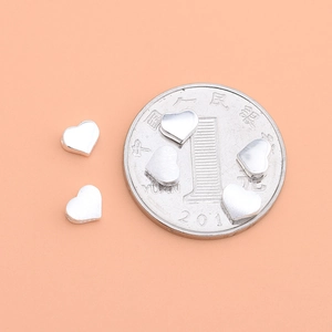 S925 sterling silver heart beads for DIY jewelry with coin for size reference