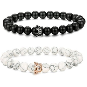 Detail of 8mm matte black and white turquoise bead bracelets with crown charms