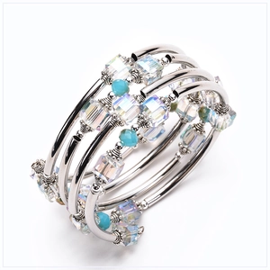 Detail of multi-layer silver beaded bracelet with aurora crystals and sky blue beads
