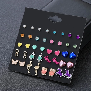 Set of 30 pairs golden fashion earrings featuring unicorn and animal stud designs
