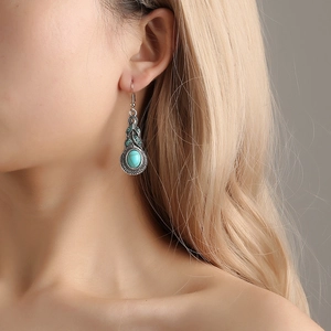 Boucles d'oreilles bohèmes vintage avec pierres turquoise et sculptures florales en argent