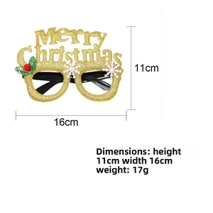 Detail view of golden glittery Christmas glasses frame with Merry Christmas festive lettering