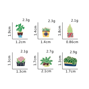 Detail view of colorful enamel plant pins showing specific sizes and weights for each design