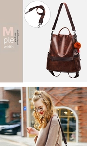 Detail of the multi-way vintage brown soft leather backpack with detachable shoulder strap