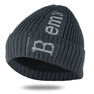 Detail shot of a dark grey knit beanie with B emy lettering and thick ribbed texture
