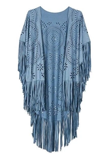 Detailed view of blue faux suede shawl featuring laser-cut circular patterns and long fringe