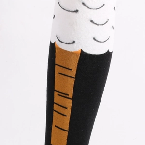 Close-up of funny chicken leg pattern over-knee socks with white and orange knit detail