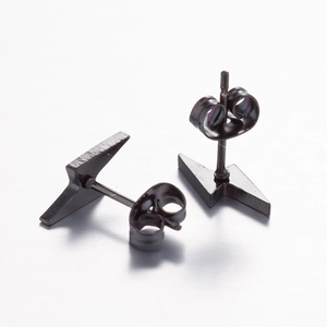 Detailed view of black stainless steel lightning bolt stud earrings with butterfly backs