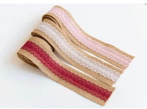 Detailed texture of burlap and lace ribbons in pink, white, and dark red colors