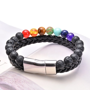 Detail of 7 chakra stone beads and black lava rock on woven cord with magnetic clasp