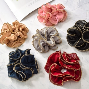 Set of six chiffon scrunchies with gold metallic edges in pink, khaki, and navy