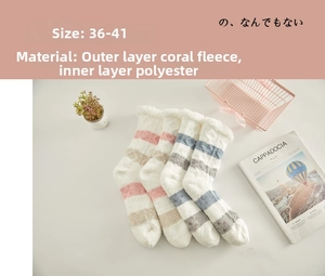 Detail of soft striped coral fleece socks with thick lining and material composition label