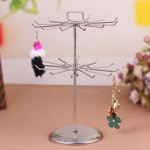Rotating two-tier silver metal jewelry display stand with multiple hooks for necklaces
