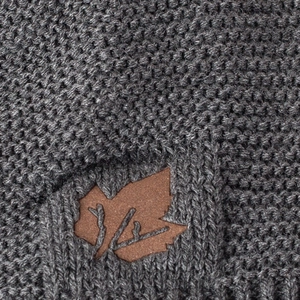 Dark grey knit beanie featuring a brown leather maple leaf patch with warm fleece lining