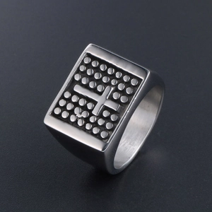 Vintage stainless steel signet ring for men featuring a raised cross and dotted texture