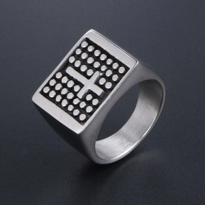 Vintage stainless steel signet ring for men featuring a cross relief and dot pattern