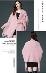 Pink faux mink fur shawl cardigan with long sleeves and elegant fringe hem detail
