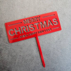 Red acrylic rectangular Merry Christmas cake topper with festive cutout lettering