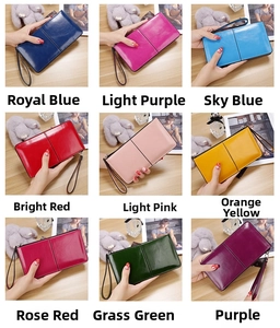 Collage showing a long zip wallet in nine vibrant colors with a detachable wrist strap