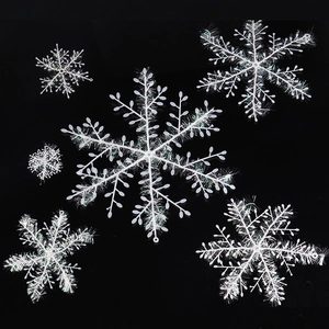 Set of 6 white Christmas snowflake ornaments in mixed sizes for holiday tree decoration