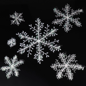 Sparkling white and silver snowflake ornaments for Christmas tree and holiday decoration