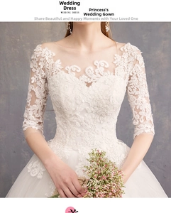 Exquisite floral lace embroidery detail on white off-shoulder bridal gown with 3/4 sleeves