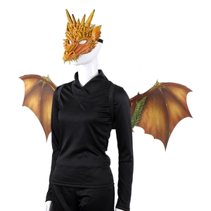 Detailed view of the dragon mask and wings set in orange gradient on a mannequin display
