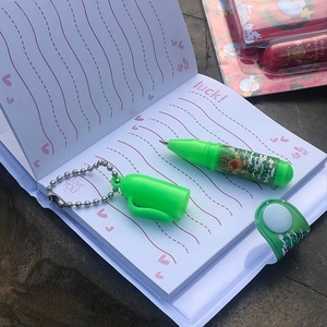 Cute cartoon notebook and ballpoint pen set, portable journal with heart lines and decorative pen.